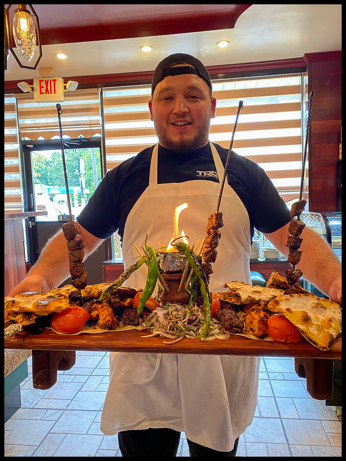 Our chef with a flaming platter
